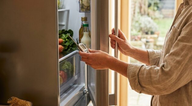 Why your fridge struggles in summer: kitchen heat loads, condenser airflow, and safe performance checks (no repair how-to)
